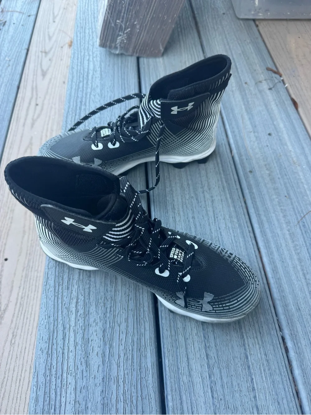 Under Armour Men’s Black and White High-Top Athletic Cleats